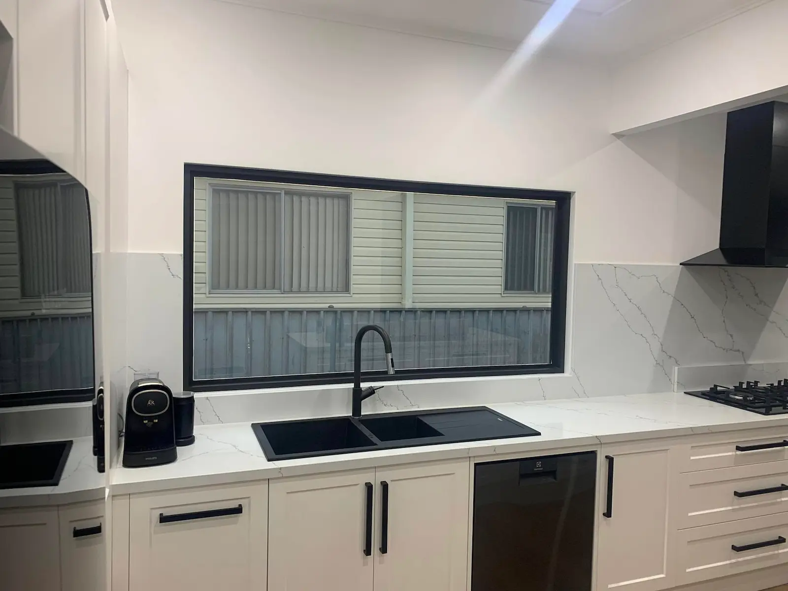 Kitchen mirror tint installation completed in Mayfield NSW